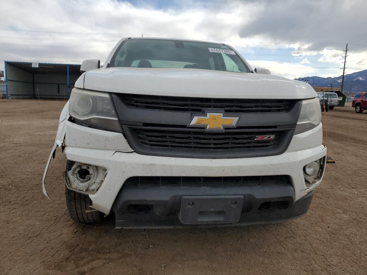 2015 Chevrolet Colorado VIN 1GCGTCE37F1240580 Copart auction photo, side / front end damage thumbnail 5