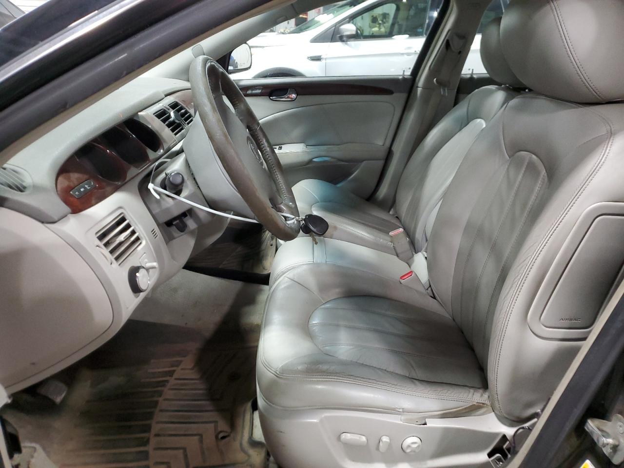 2010 Buick Lucerne VIN 1G4HC5EM0AU106179 Copart auction photo, burn - interior damage thumbnail 7