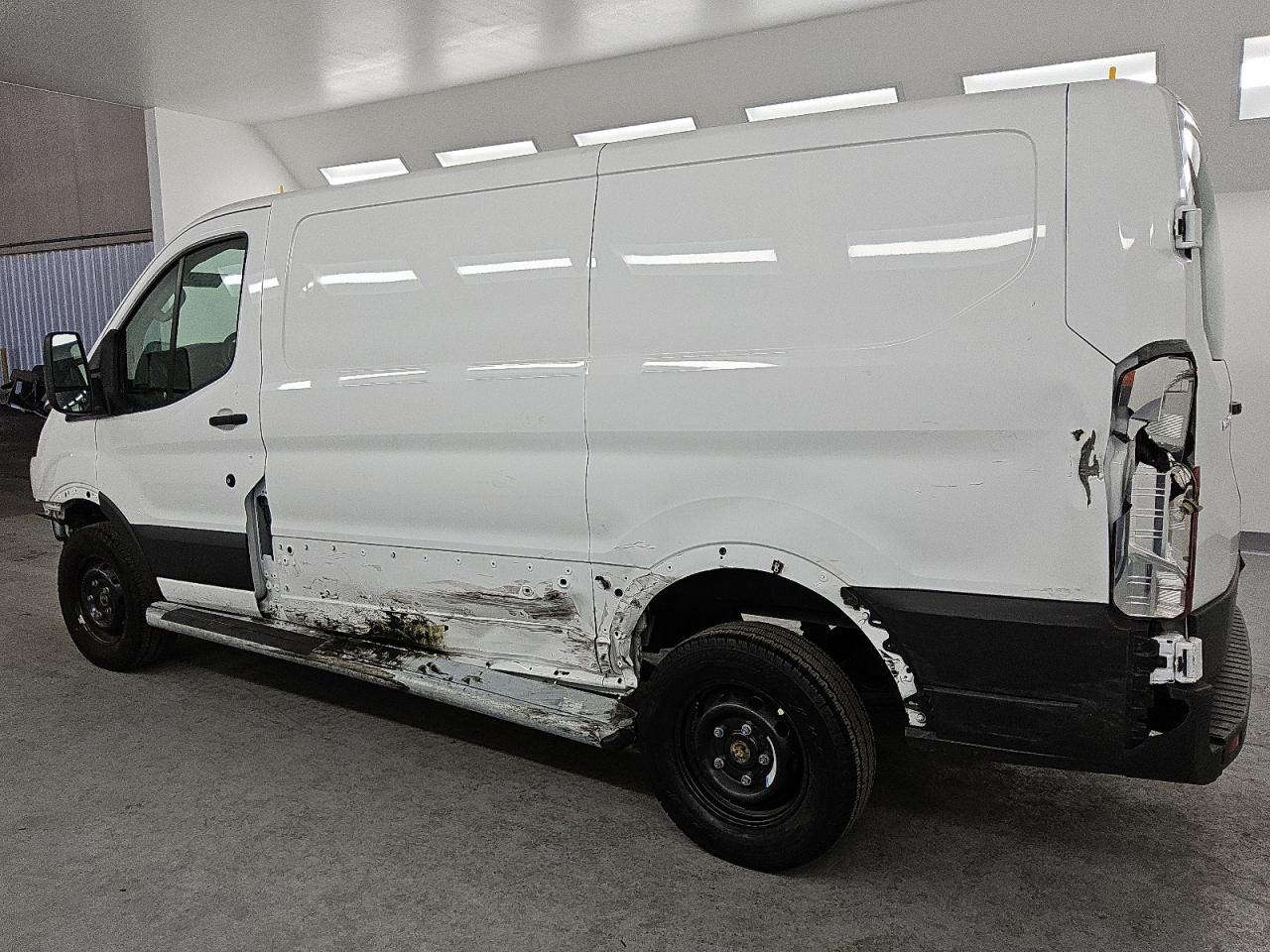 2023 Ford Transit VIN 1FTBR1Y86PKB40356 Copart auction photo, side damage thumbnail 2