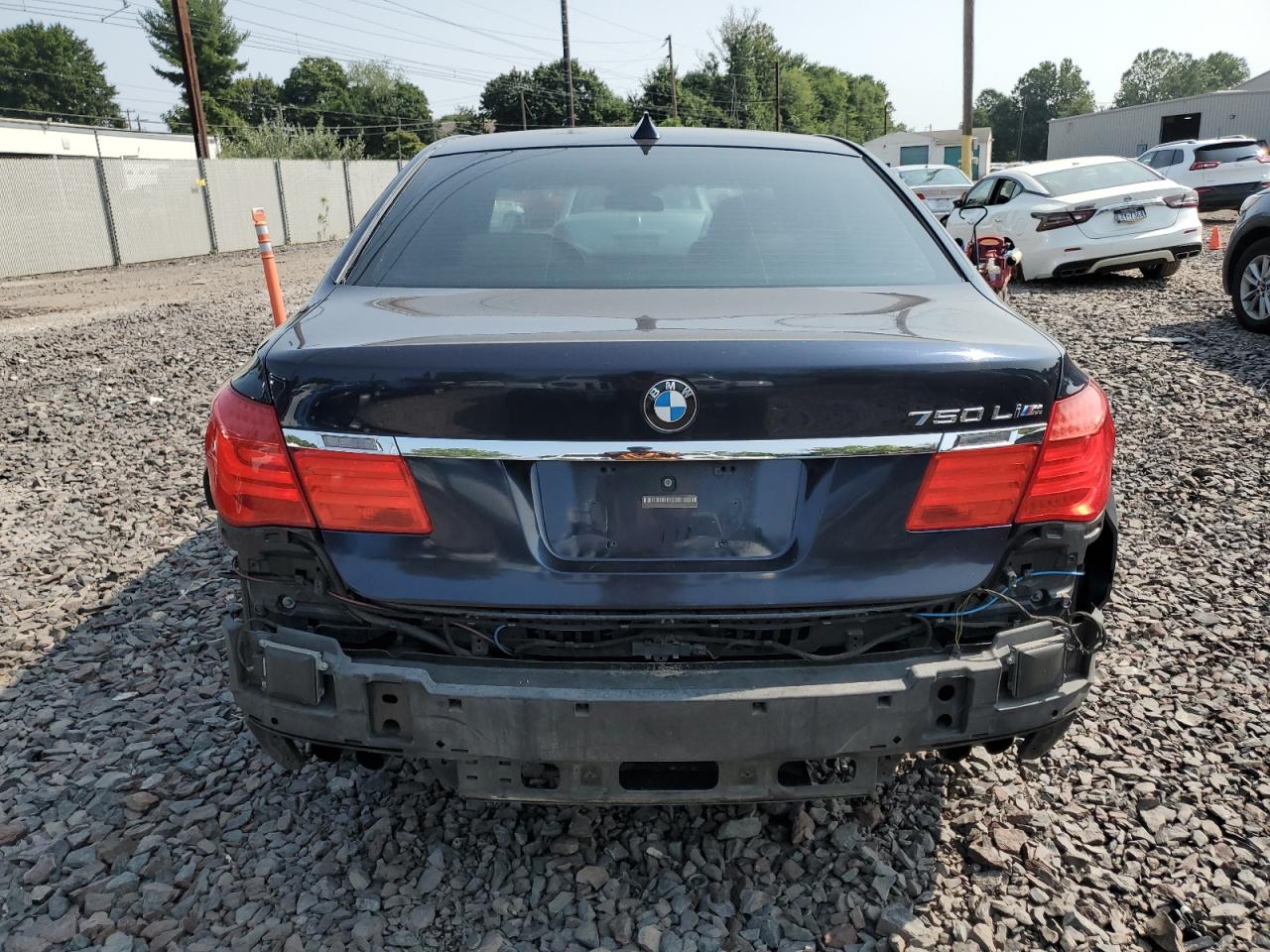 2011 BMW 7er VIN WBAKB8C52BCY66175 Copart auction photo, front end / rear end damage thumbnail 6