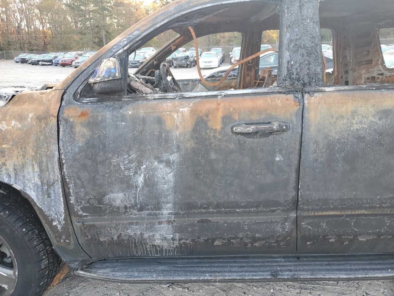 2016 Chevrolet Tahoe VIN 1GNSKCKC9GR268909 Copart auction photo, burn damage thumbnail 7