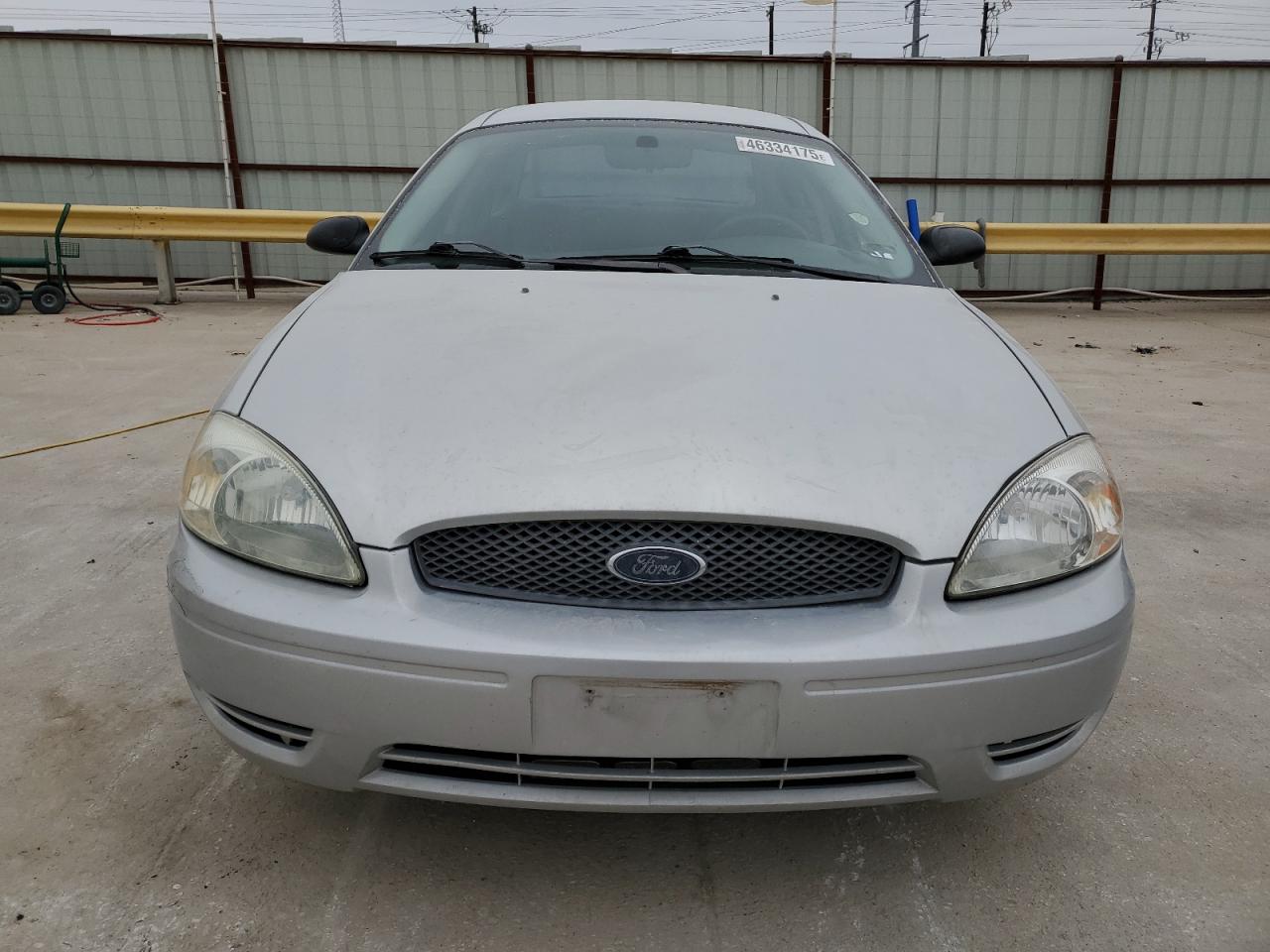 2004 Ford Taurus VIN 1FAFP52224A203303 Copart auction photo, side / minor dent/scratches damage thumbnail 5