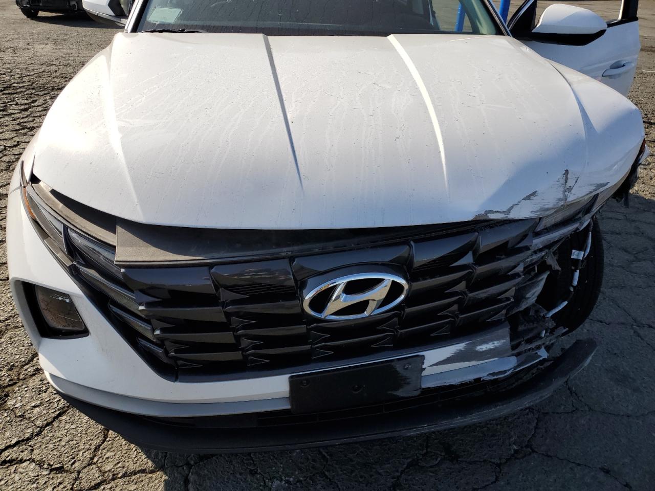 2023 Hyundai Tucson VIN 5NMJACAE4PH275880 Copart auction photo, front end / minor dent/scratches damage thumbnail 12