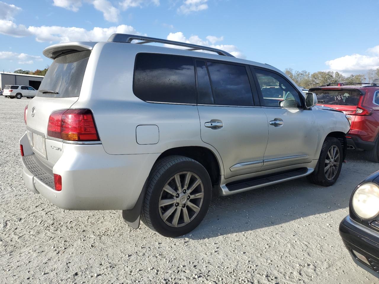 2011 Lexus LX VIN JTJHY7AX9B4076440 Copart auction photo, front end / minor dent/scratches damage thumbnail 3