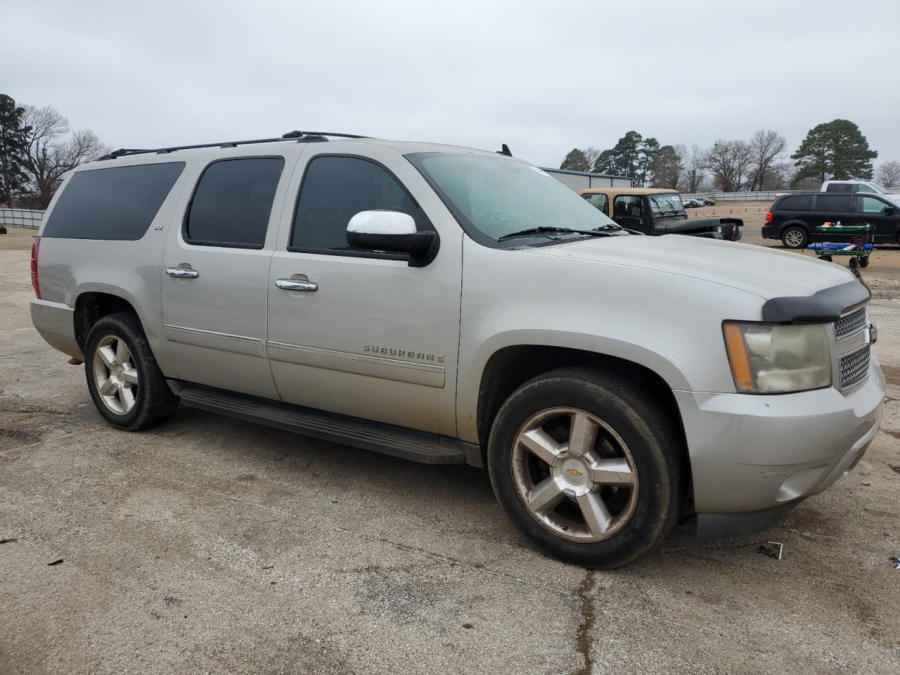 2009 Chevrolet Suburban VIN 1GNFC36089R190088 Copart auction photo, side / rear end damage thumbnail 4