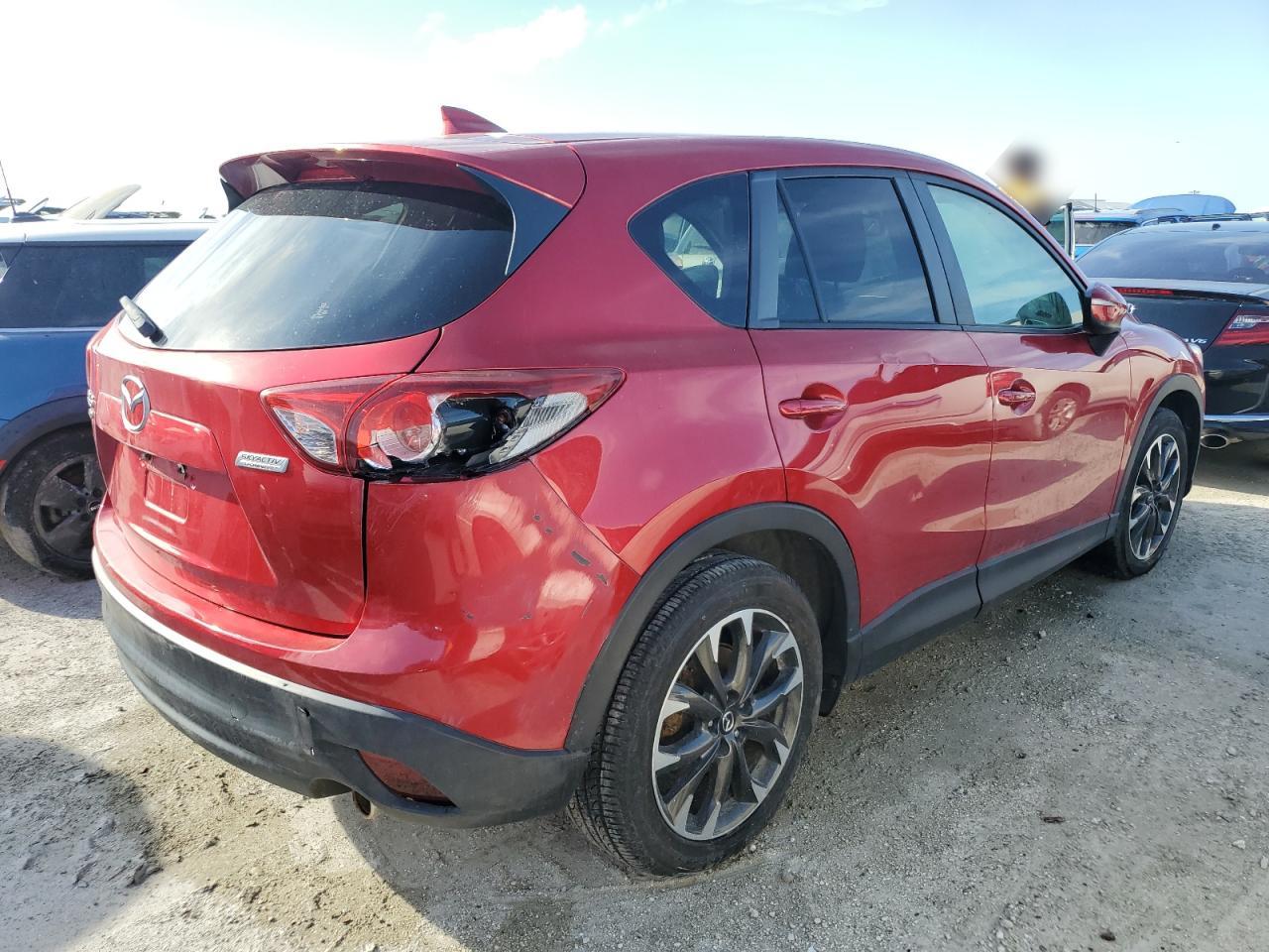 2016 Mazda CX-5 VIN JM3KE4DY8G0883672 Copart auction photo, water/flood / all over damage thumbnail 3