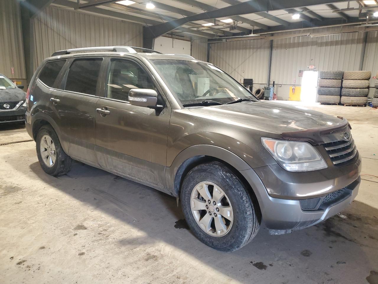 2009 KIA Mohave (borrego) VIN KNDJH741X95026999 Copart auction photo, front end / minor dent/scratches damage thumbnail 4