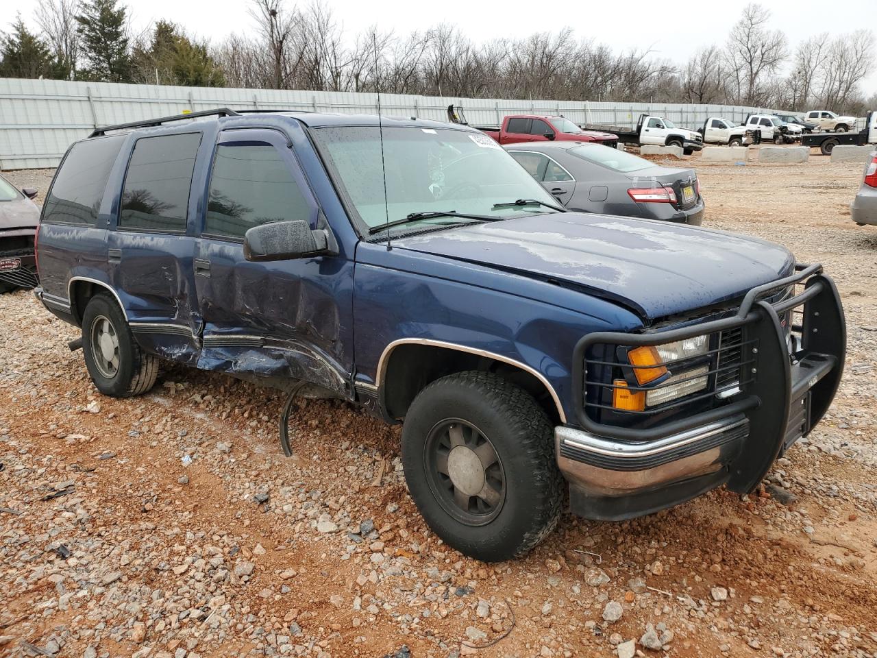 1999 GMC Yukon VIN 1GKEC13R1XJ812283 Copart auction photo, all over damage thumbnail 4