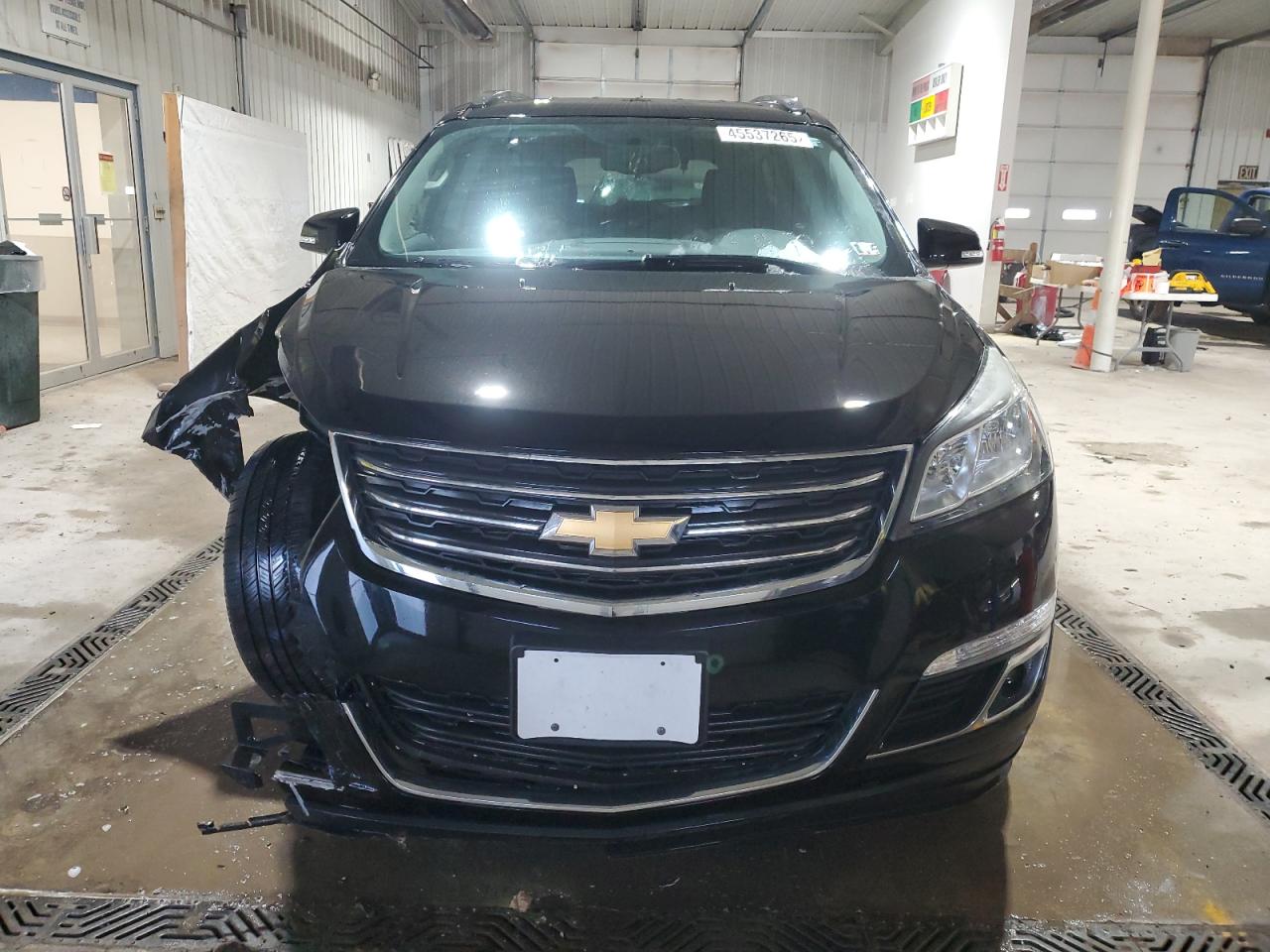 2016 Chevrolet Traverse VIN 1GNKRGKD3GJ296330 Copart auction photo, front end / side damage thumbnail 5