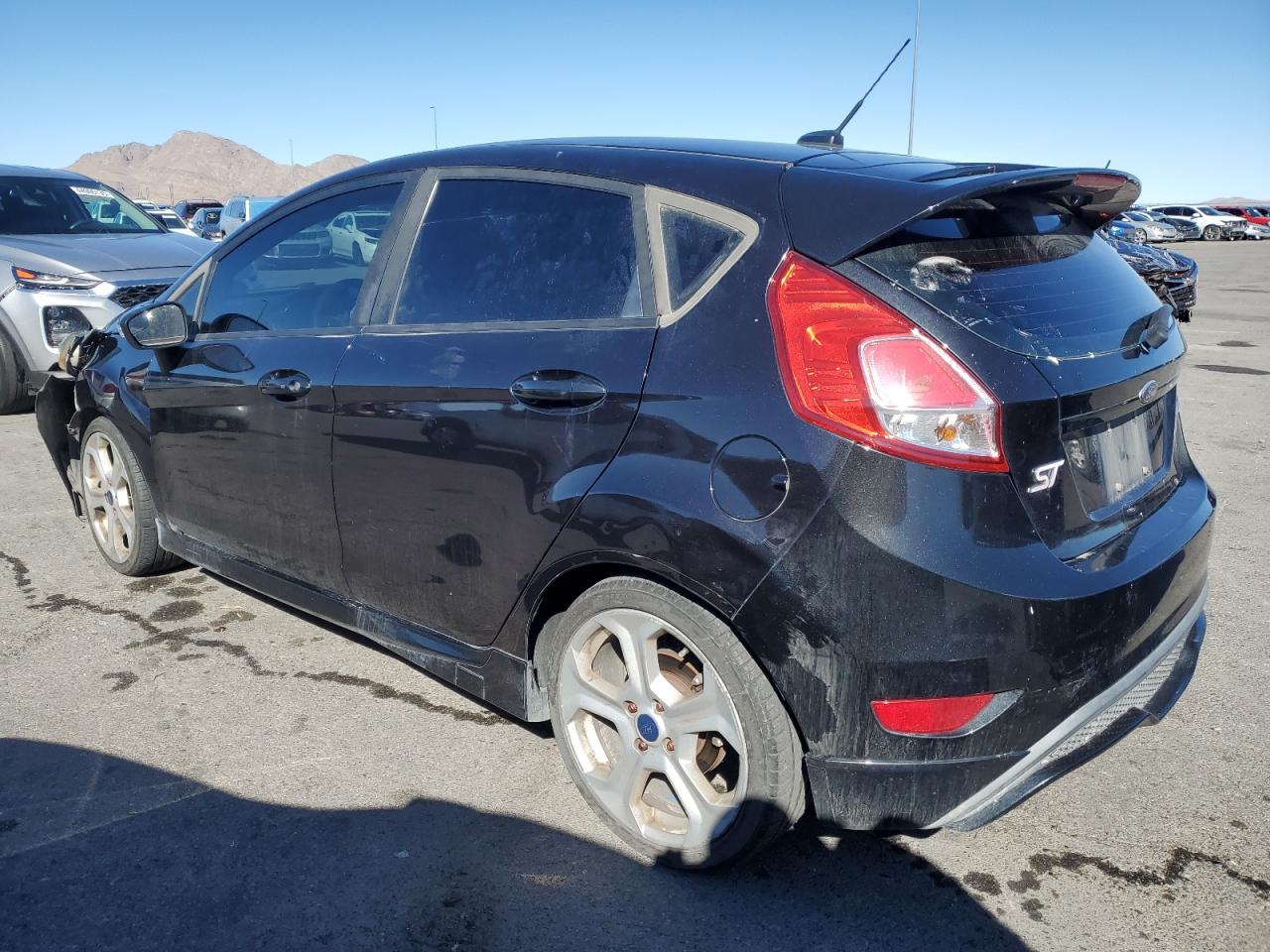 2015 Ford Fiesta VIN 3FADP4GXXFM118219 Copart auction photo, front end / rear end damage thumbnail 2