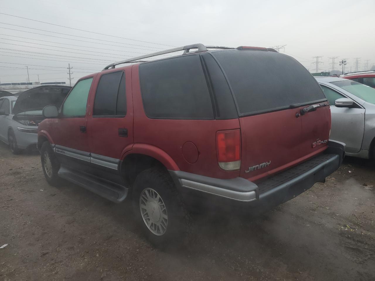 1995 GMC Jimmy VIN 1GKDT13W0S2519253 Copart auction photo, rear end damage thumbnail 2