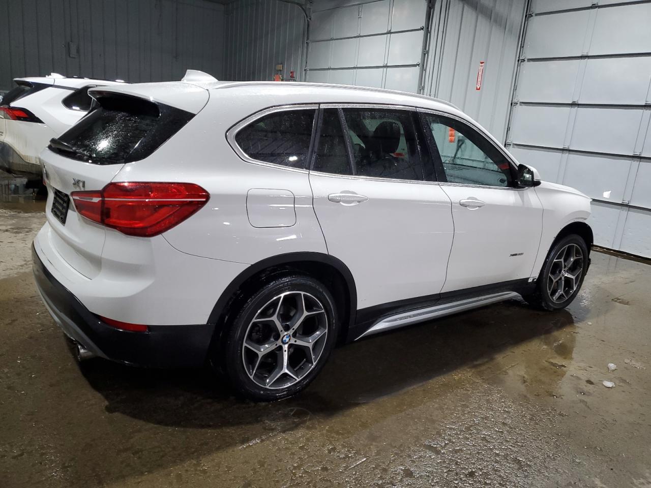2017 BMW X1 VIN WBXHT3C33H5F85551 Copart auction photo, front end / minor dent/scratches damage thumbnail 3