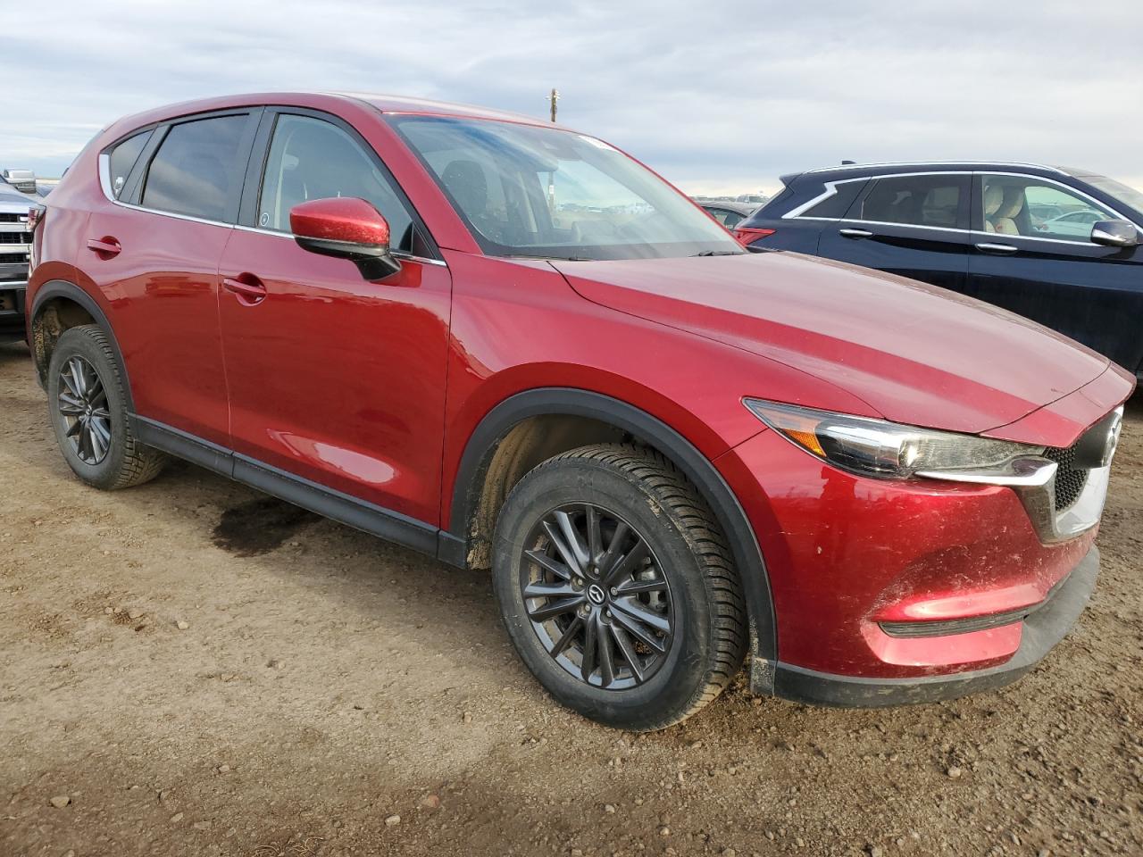 2021 Mazda CX-5 VIN JM3KFBBL0M0130903 Copart auction photo, hail / minor dent/scratches damage thumbnail 4