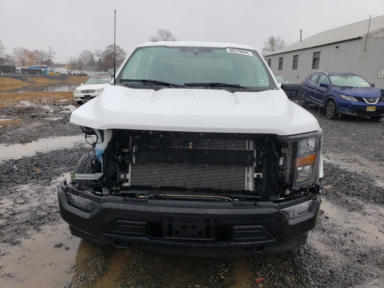 2023 Ford F-150 VIN 1FTFW1ED4PFC11929 Copart auction photo, side / front end damage thumbnail 5