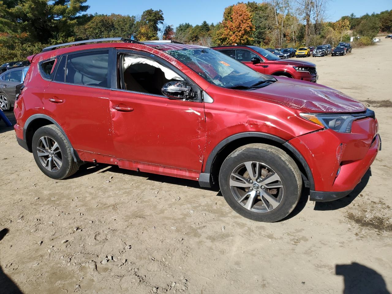 2017 Toyota RAV 4 VIN JTMRFREV4HJ170527 Copart auction photo, side / front end damage thumbnail 4