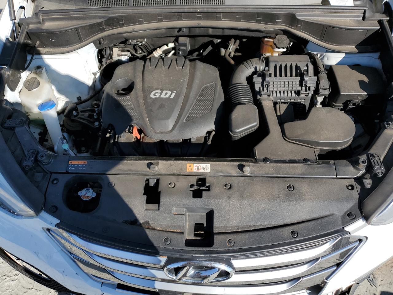 2015 Hyundai Santa Fe VIN 5XYZU3LB4FG284679 Copart auction photo, front end / side damage thumbnail 14