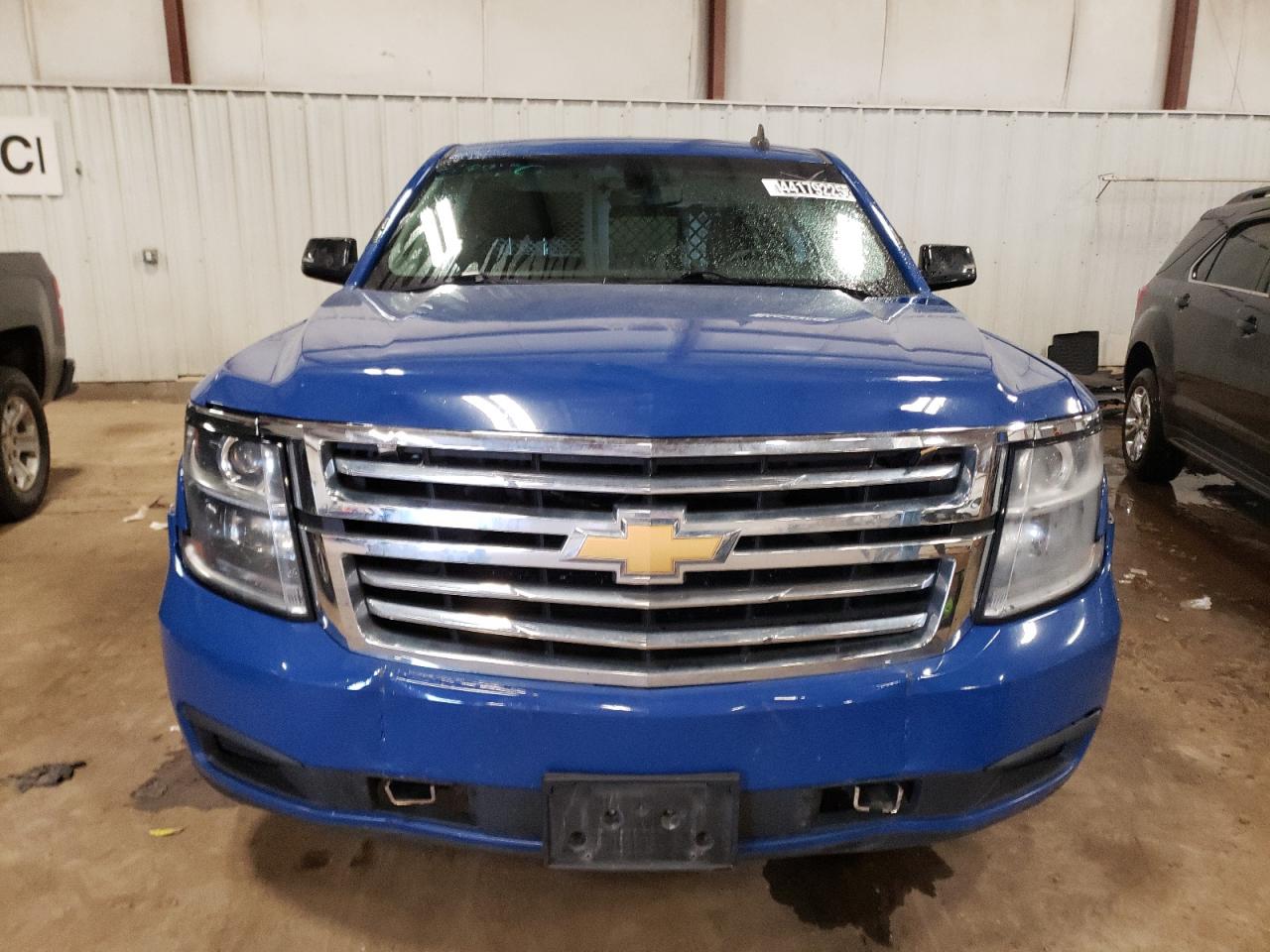 2019 Chevrolet Tahoe VIN 1GNSKDEC5KR400560 Copart auction photo, side / front end damage thumbnail 5