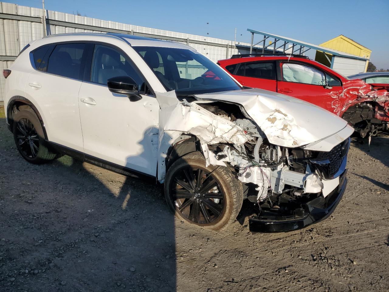 2022 Mazda CX-5 VIN JM3KFBAY7N0597010 Copart auction photo, front end damage thumbnail 4