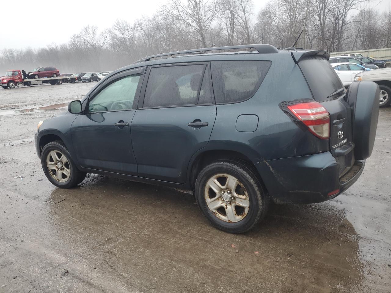 2010 Toyota RAV 4 VIN 2T3BF4DV0AW032044 Copart auction photo, side / front end damage thumbnail 2