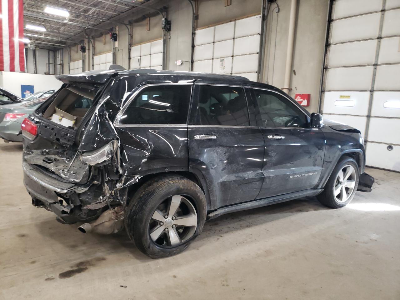 2015 Jeep Grand Cherokee VIN 1C4RJFBG5FC828313 Copart auction photo, rear end / front end damage thumbnail 3