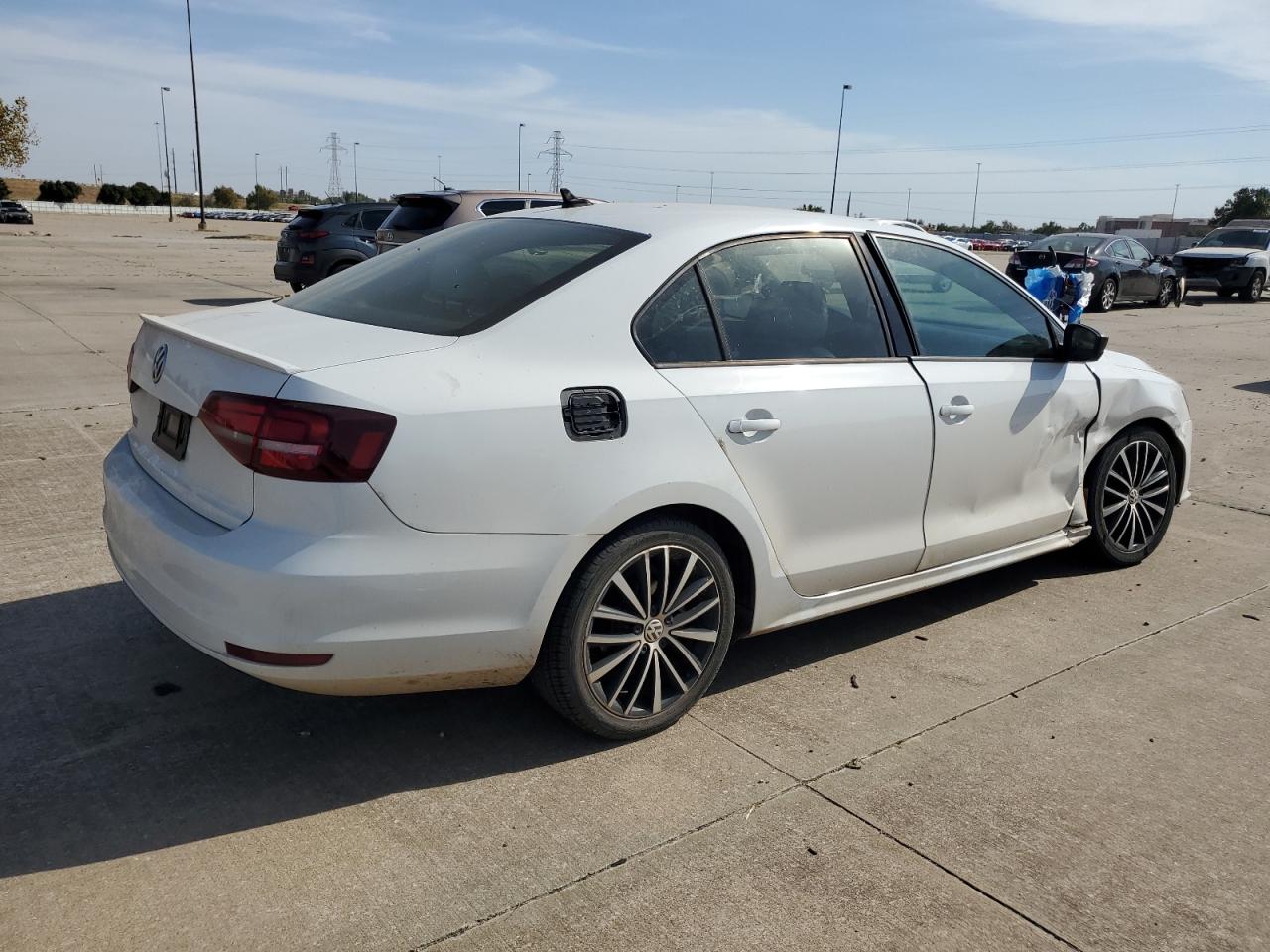 2016 Volkswagen Jetta VIN 3VWD17AJ8GM240559 Copart auction photo, side / minor dent/scratches damage thumbnail 3