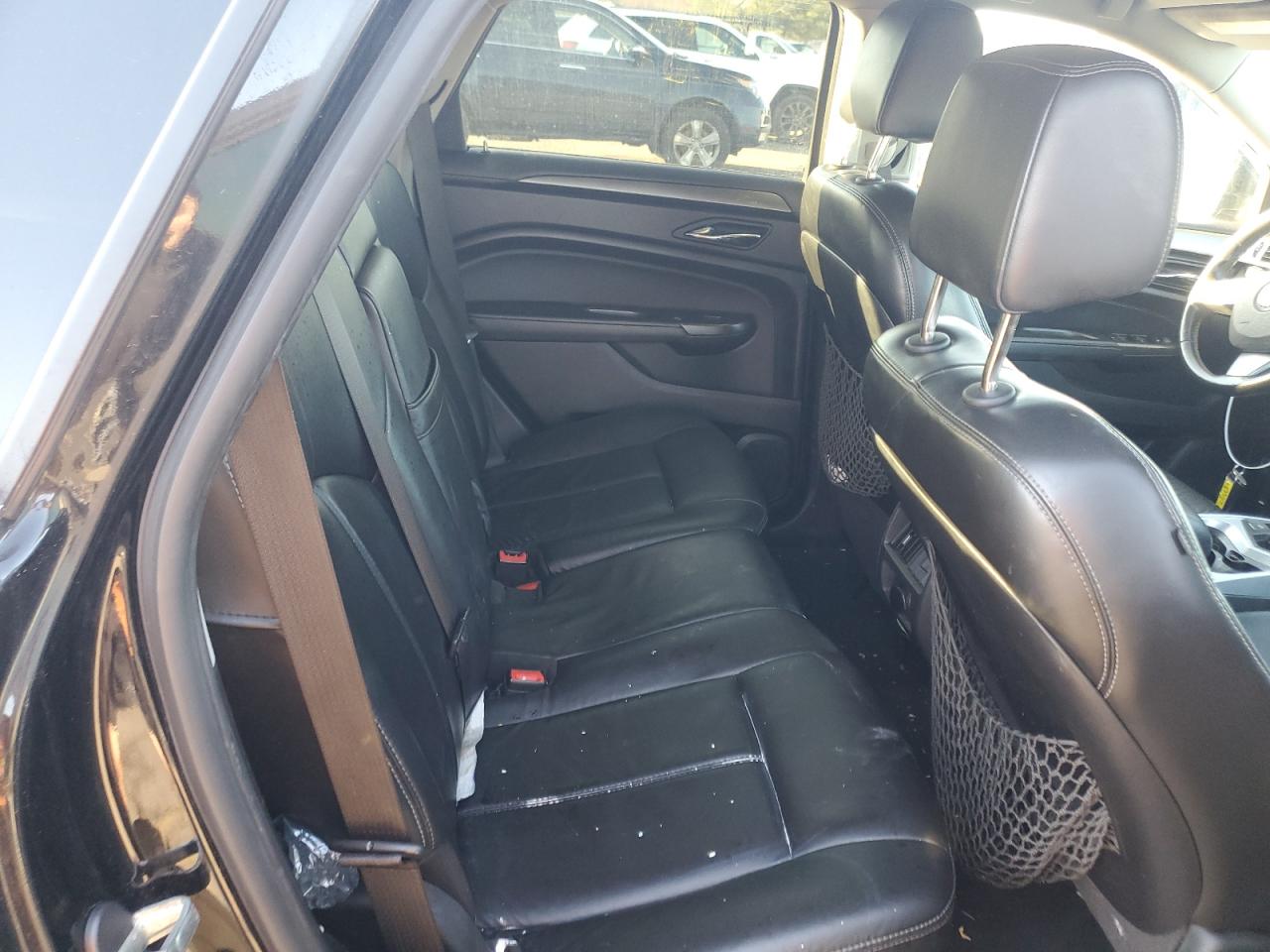 2012 Cadillac SRX VIN 3GYFNGE39CS657443 Copart auction photo, front end / side damage thumbnail 11