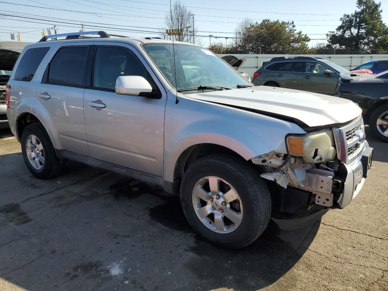 2011 Ford Escape VIN 1FMCU9EG7BKB35734 Copart auction photo, front end / side damage thumbnail 4