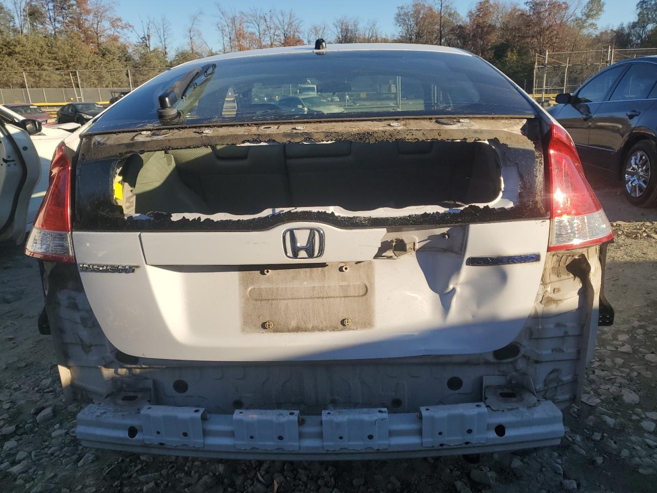 2010 Honda Insight VIN JHMZE2H75AS036342 Copart auction photo, rear end / minor dent/scratches damage thumbnail 6