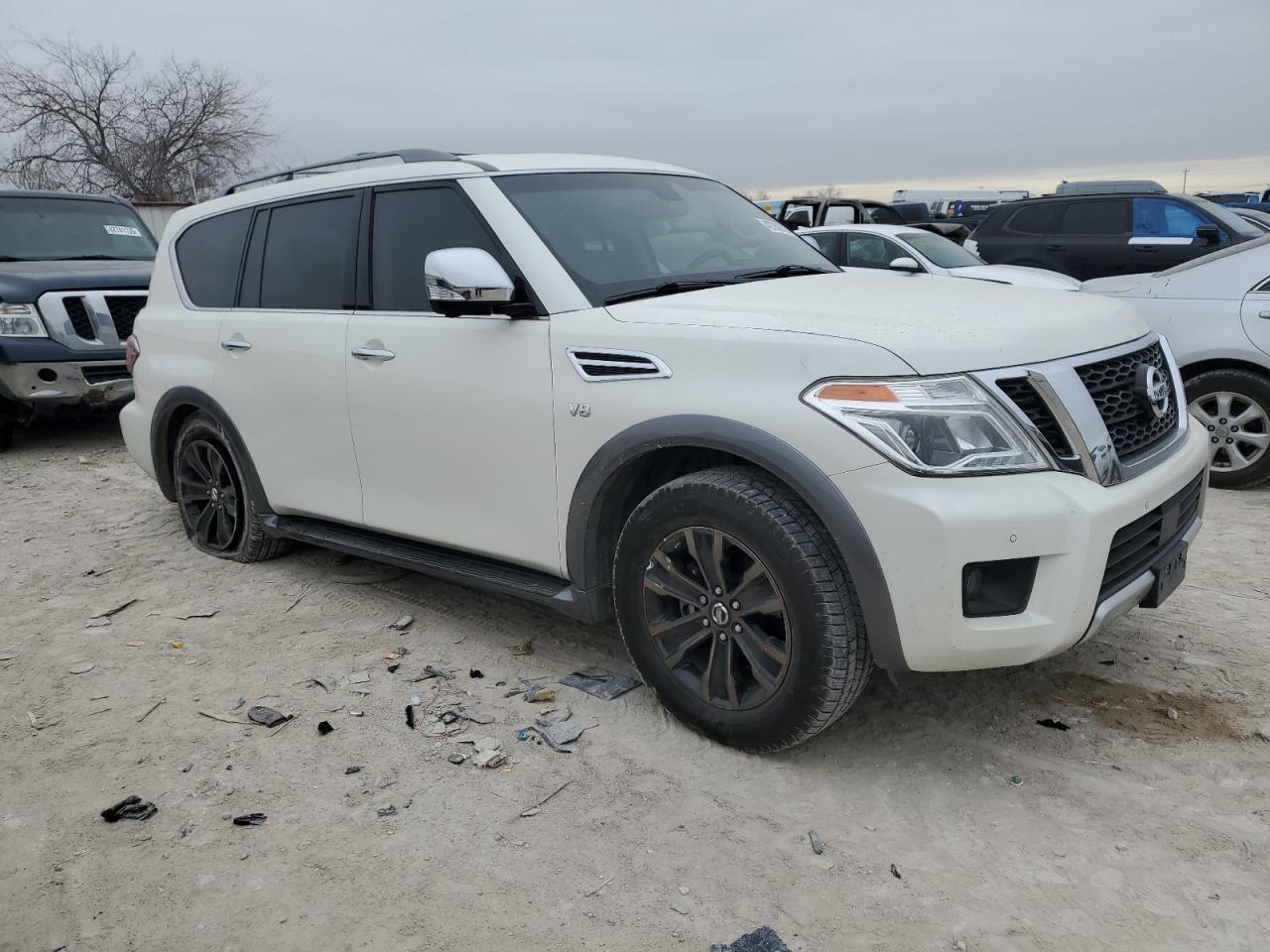2017 Nissan Armada VIN JN8AY2NFXH9304034 Copart auction photo, side damage thumbnail 4