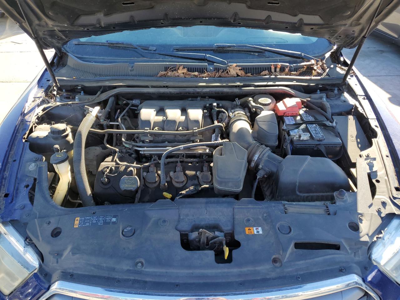2013 Ford Taurus VIN 1FAHP2E80DG212201 Copart auction photo, side / front end damage thumbnail 11