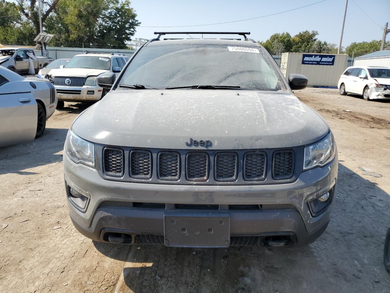 2019 Jeep Compass VIN 3C4NJDAB7KT828725 Copart auction photo, side / minor dent/scratches damage thumbnail 5