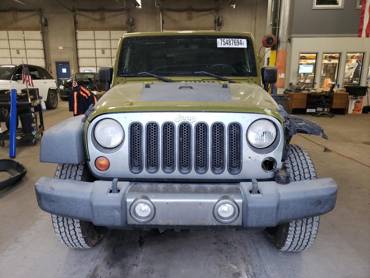 2010 Jeep Wrangler VIN 1J4GA2D15AL216706 Copart auction photo, front end damage thumbnail 5