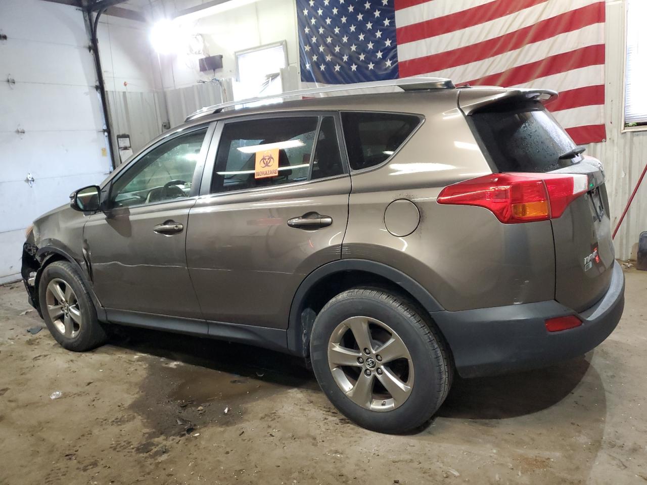 2015 Toyota RAV 4 VIN JTMRFREV1FD122253 Copart auction photo, side / front end damage thumbnail 2