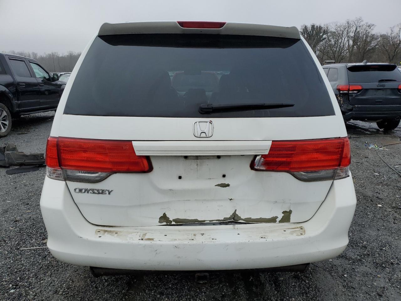 2010 Honda Odyssey VIN 5FNRL3H60AB037707 Copart auction photo, rear end damage thumbnail 6