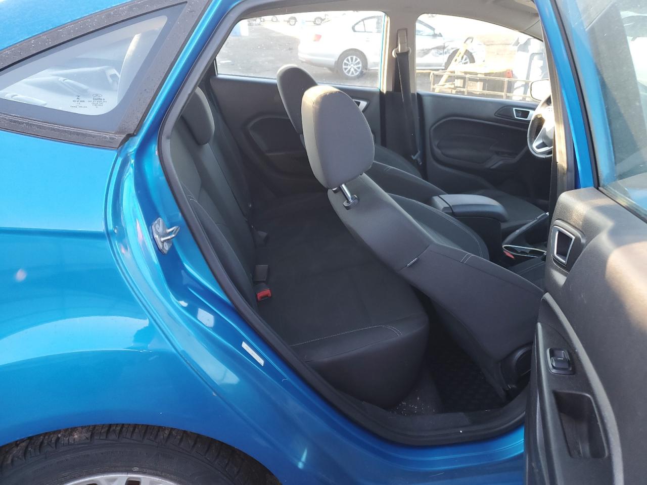 2015 Ford Fiesta VIN 3FADP4BJ2FM223856 Copart auction photo, rear end damage thumbnail 10