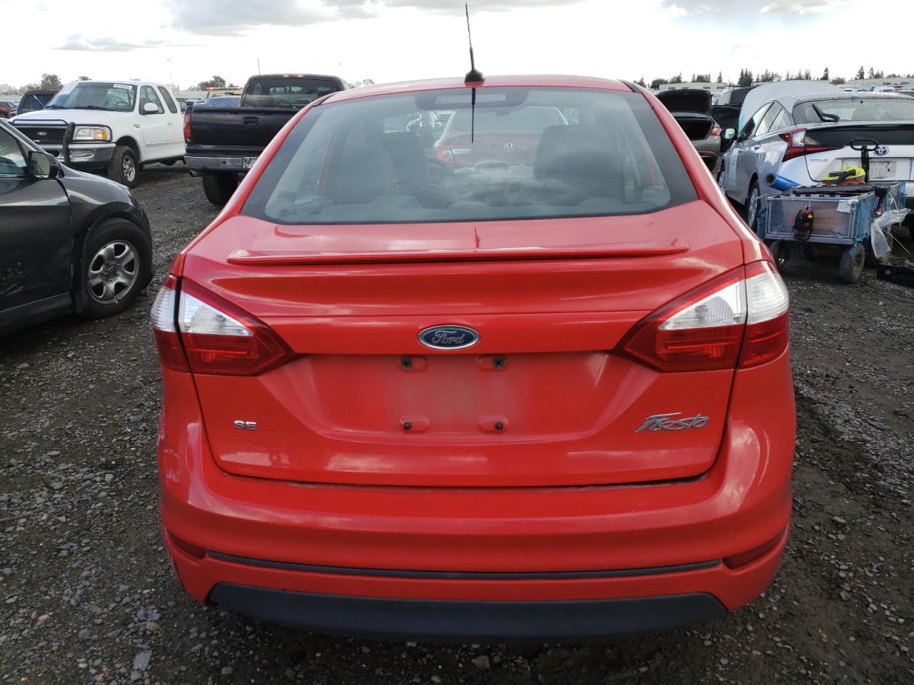 2015 Ford Fiesta VIN 3FADP4BJXFM196860 Copart auction photo, rear end damage thumbnail 6