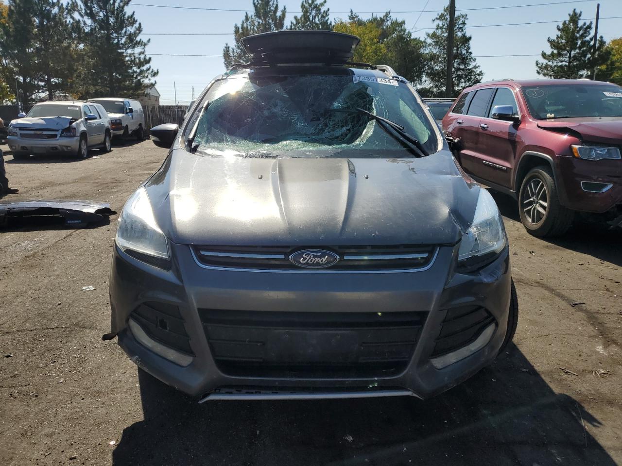 2015 Ford Escape VIN 1FMCU9J93FUC12570 Copart auction photo, all over damage thumbnail 5