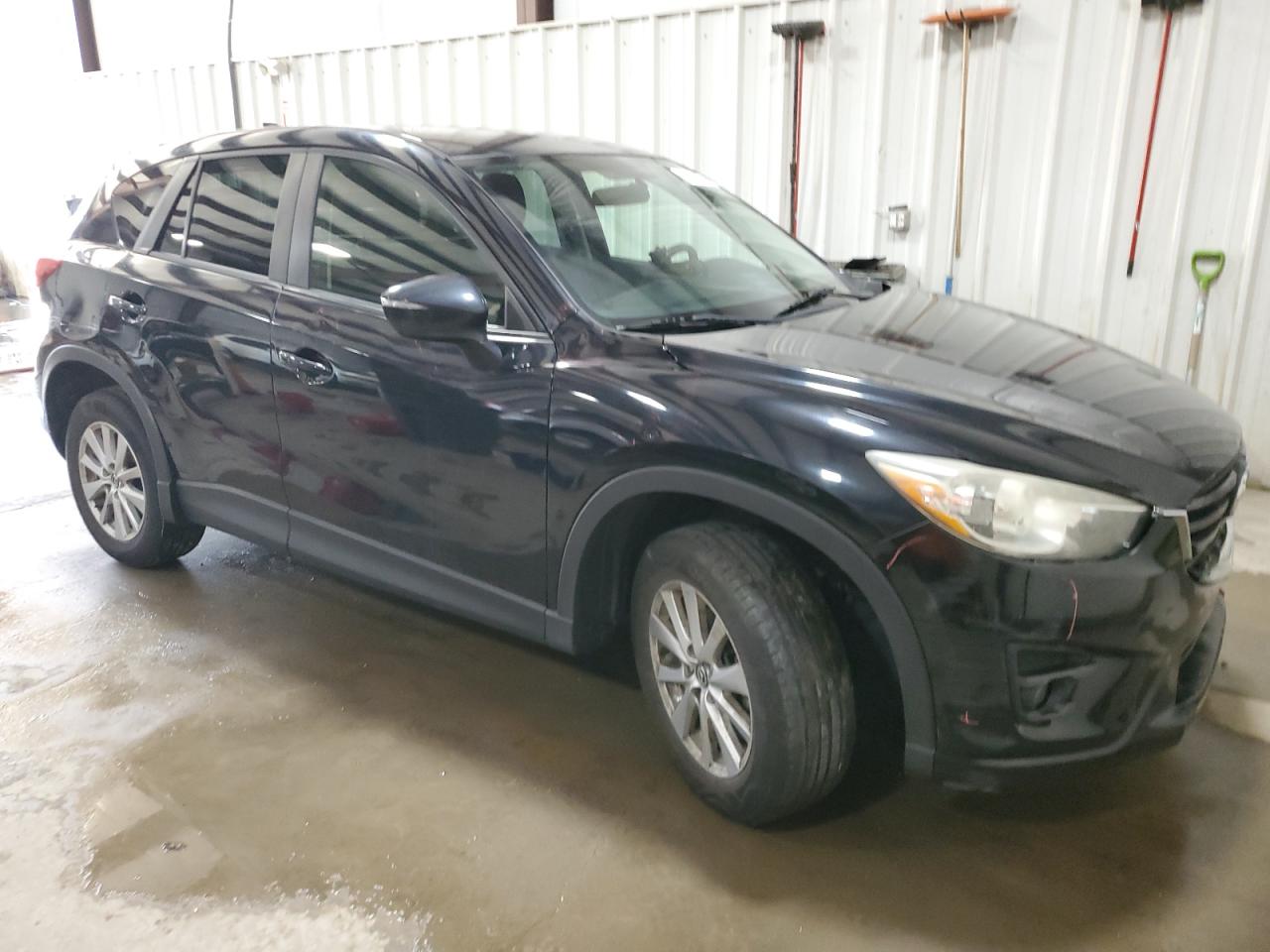 2016 Mazda CX-5 VIN JM3KE4CY3G0655581 Copart auction photo, front end damage thumbnail 4