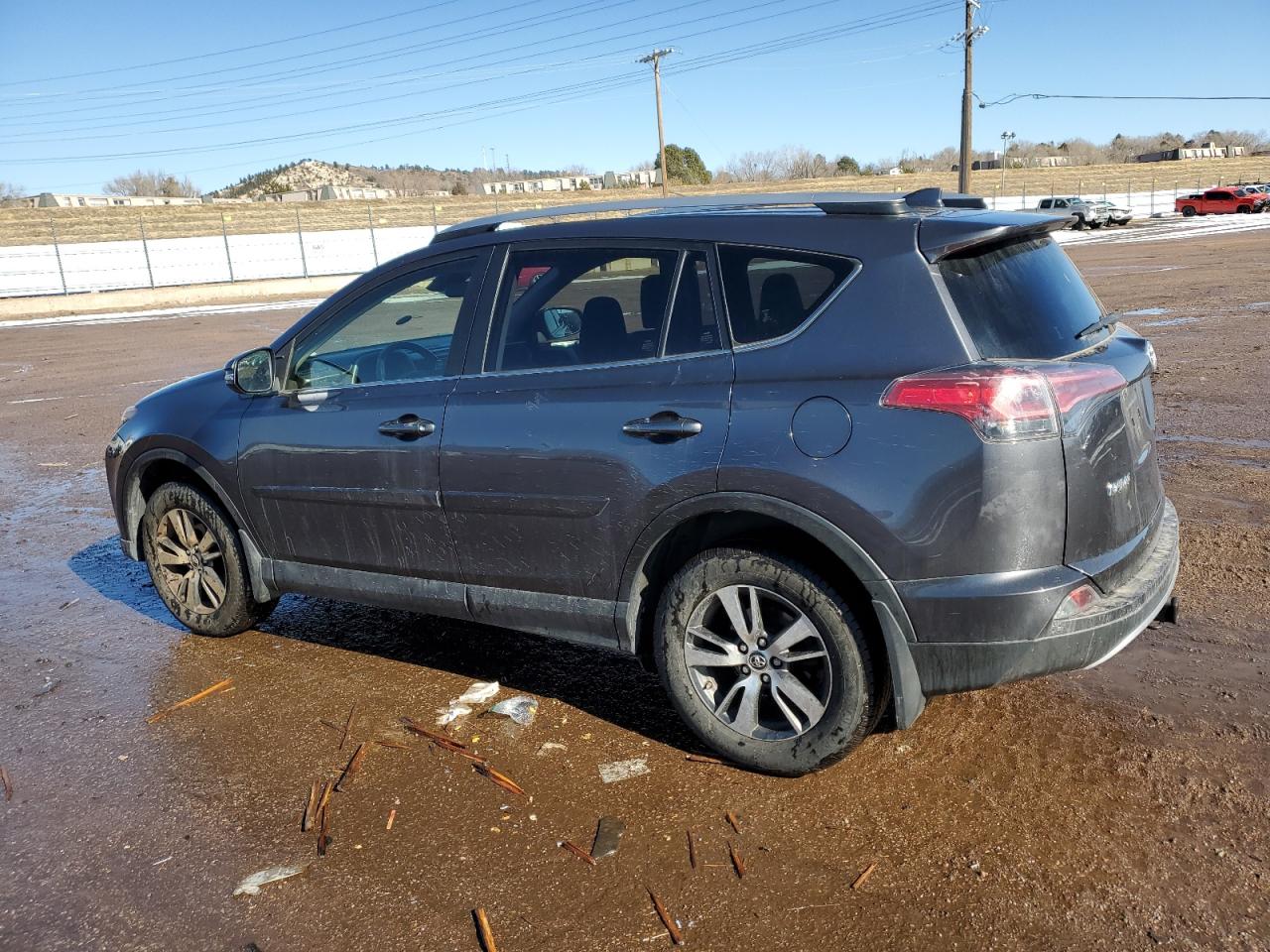 2018 Toyota RAV 4 VIN JTMRFREV0JJ218109 Copart auction photo, side / rear end damage thumbnail 2