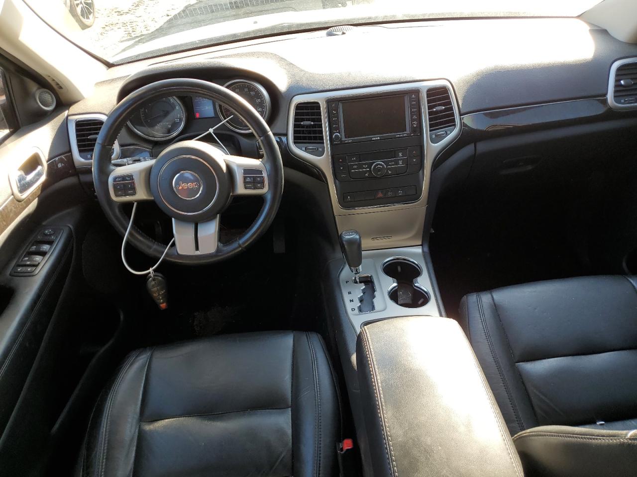 2012 Jeep Grand Cherokee VIN 1C4RJFAGXCC173918 Copart auction photo, rear end damage thumbnail 8