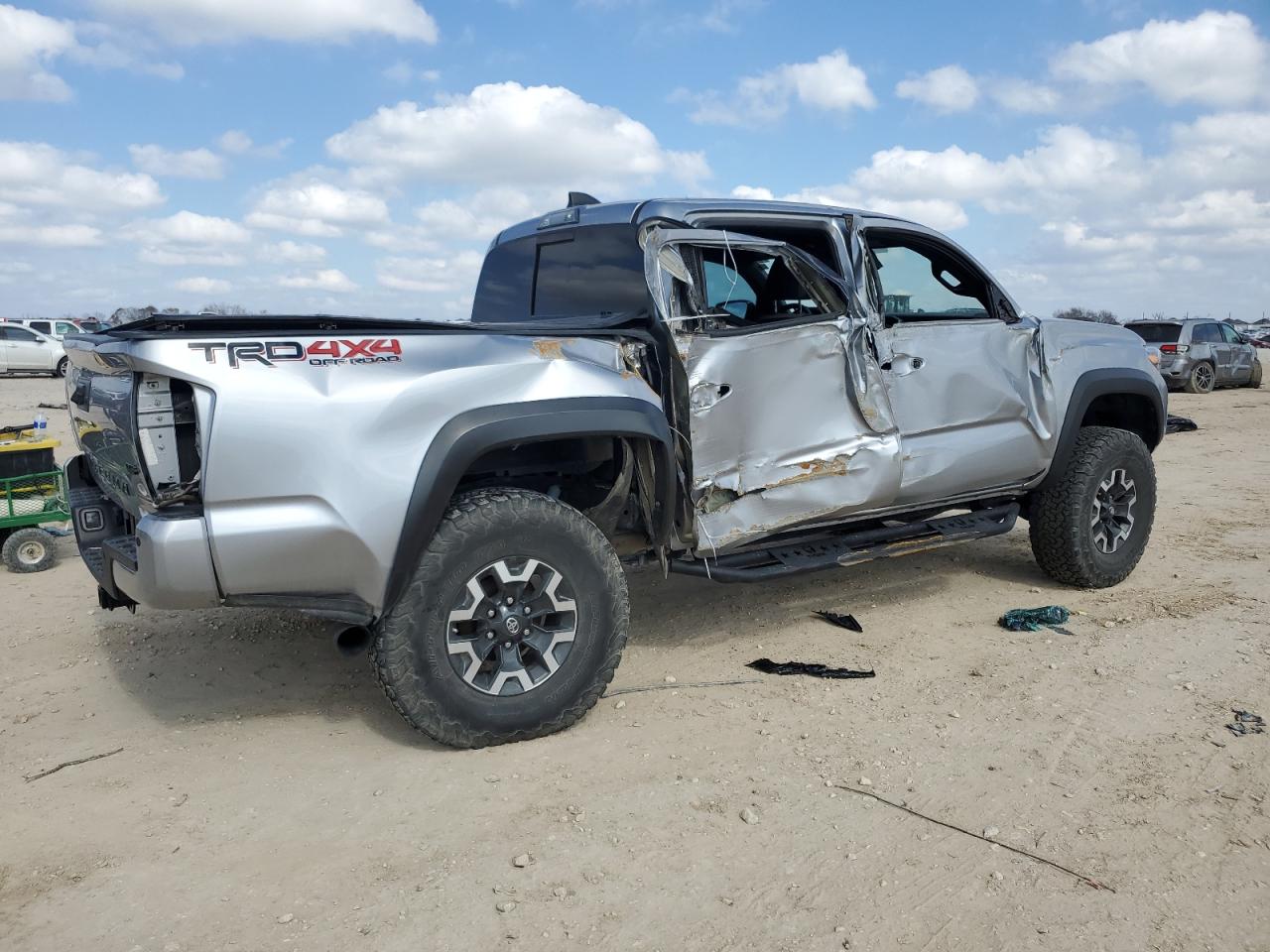 2021 Toyota Tacoma VIN 5TFCZ5AN6MX258093 Copart auction photo, side / rear end damage thumbnail 3