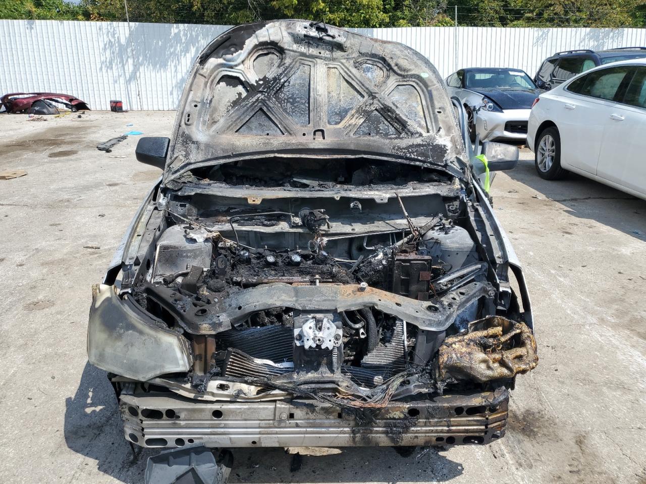 2010 Ford Focus VIN 1FAHP3FN4AW226971 Copart auction photo, burn - engine damage thumbnail 5
