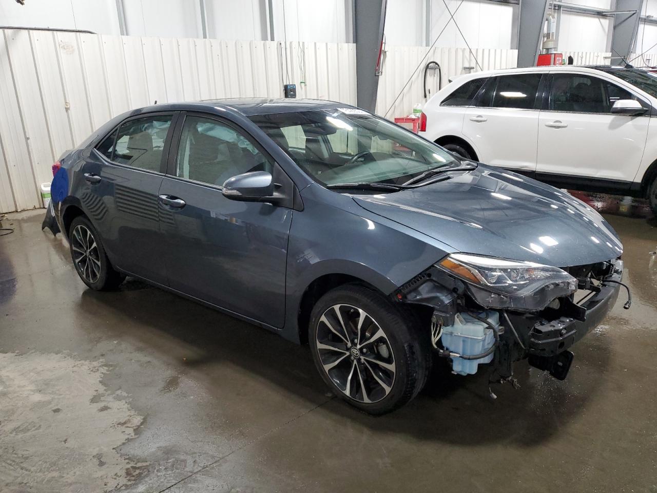 2017 Toyota Corolla VIN 2T1BURHE9HC869344 Copart auction photo, front end damage thumbnail 4