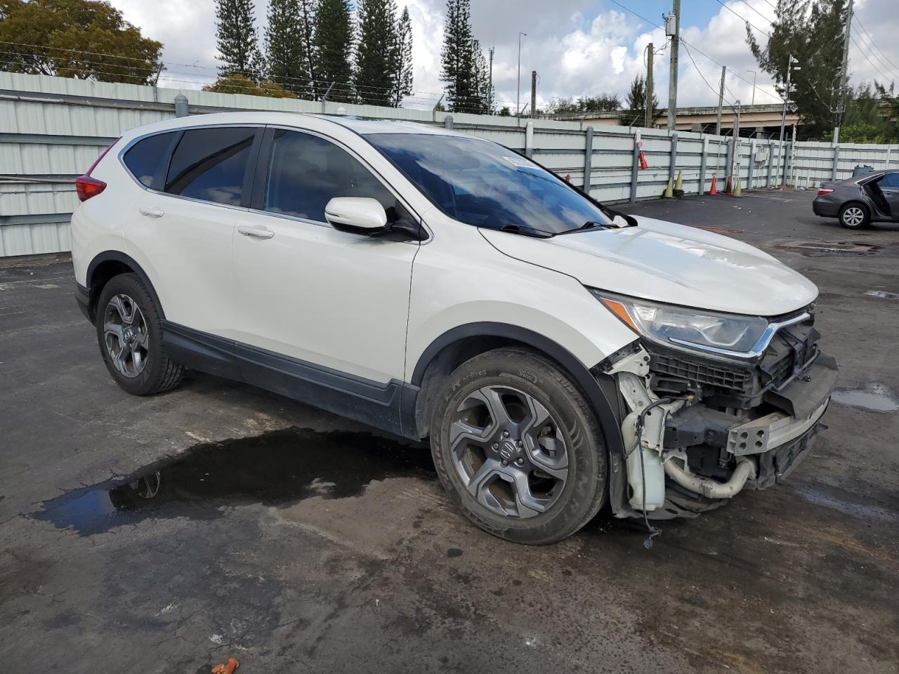 2018 Honda CR-V VIN 5J6RW1H58JL008871 Copart auction photo, all over damage thumbnail 4
