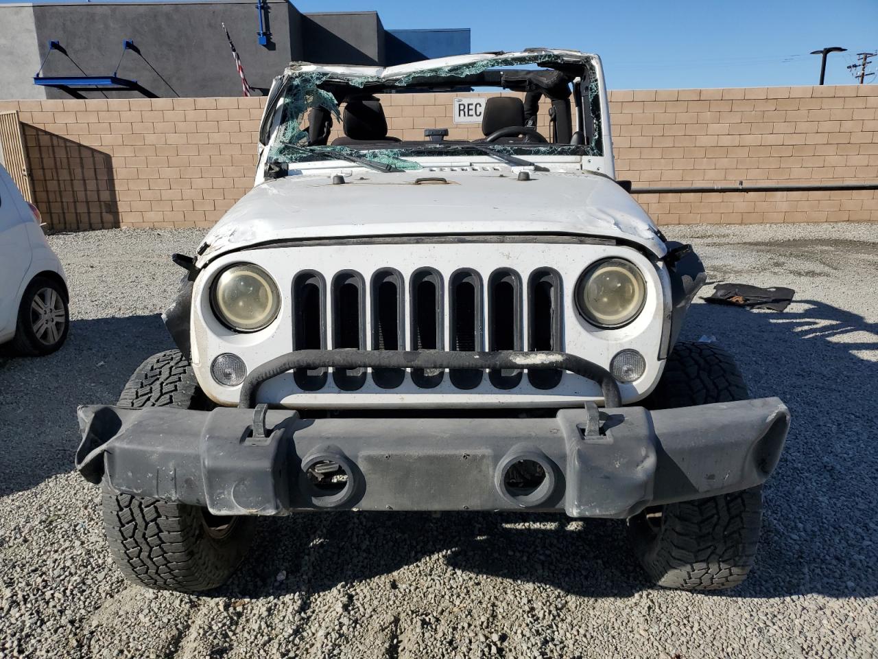 2014 Jeep Wrangler VIN 1C4AJWAGXEL190587 Copart auction photo, all over damage thumbnail 5