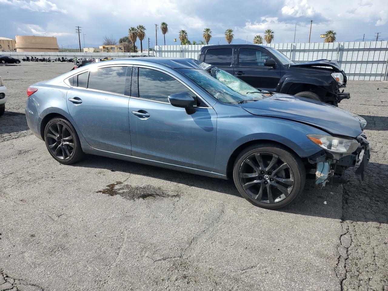 2016 Mazda 6 VIN JM1GJ1V52G1477510 Copart auction photo, rollover damage thumbnail 4