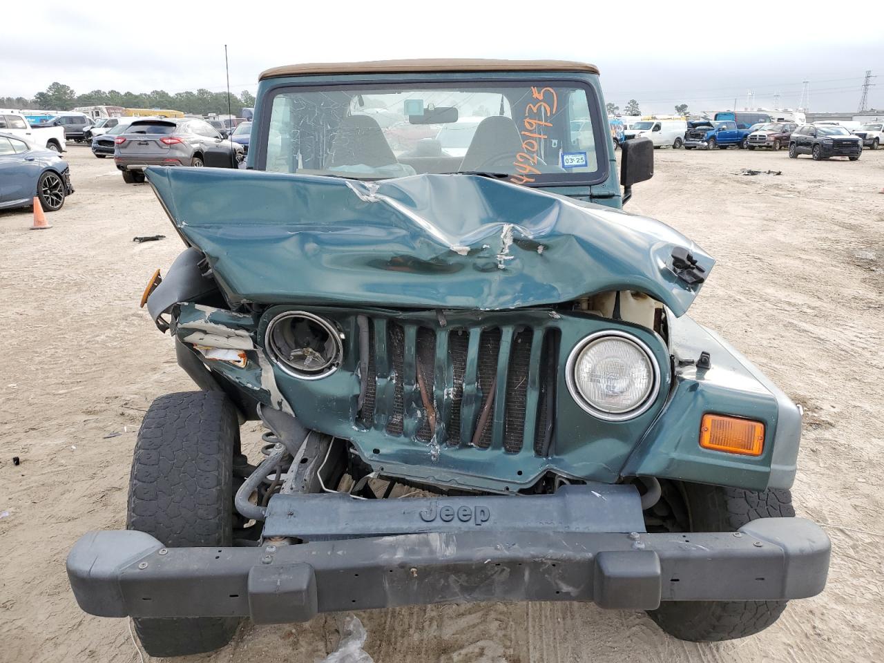 2000 Jeep Wrangler VIN 1J4FA49S1YP777304 Copart auction photo, front end damage thumbnail 5