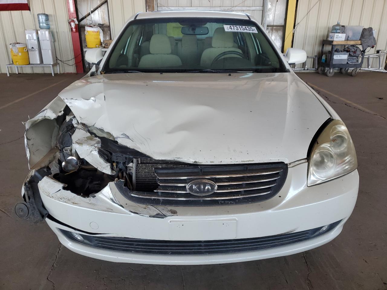 2007 KIA Optima VIN KNAGE124075087981 Copart auction photo, front end / rear end damage thumbnail 5