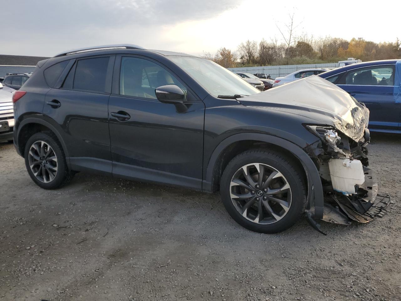 2016 Mazda CX-5 VIN JM3KE4DY9G0742514 Copart auction photo, front end damage thumbnail 4