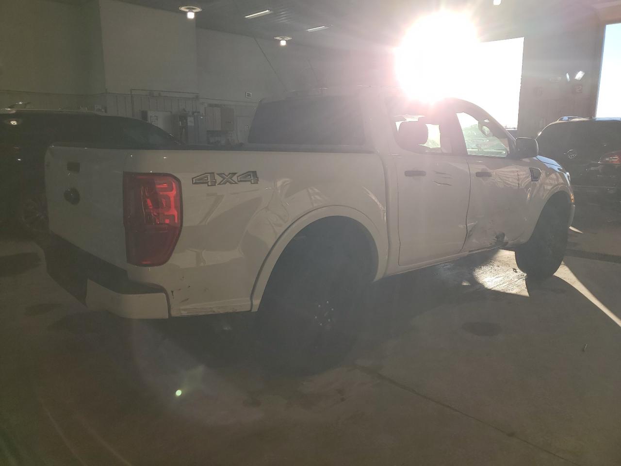 2023 Ford Ranger VIN 1FTER4FH6PLE19673 Copart auction photo, side / minor dent/scratches damage thumbnail 3